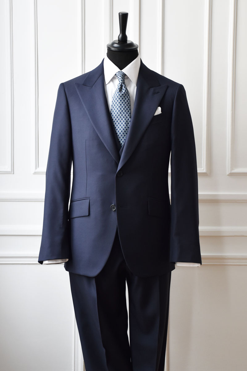 Blue marine three-piece costume by Ardentes Clipei, featuring a jacket, pants, and vest on a mannequin.