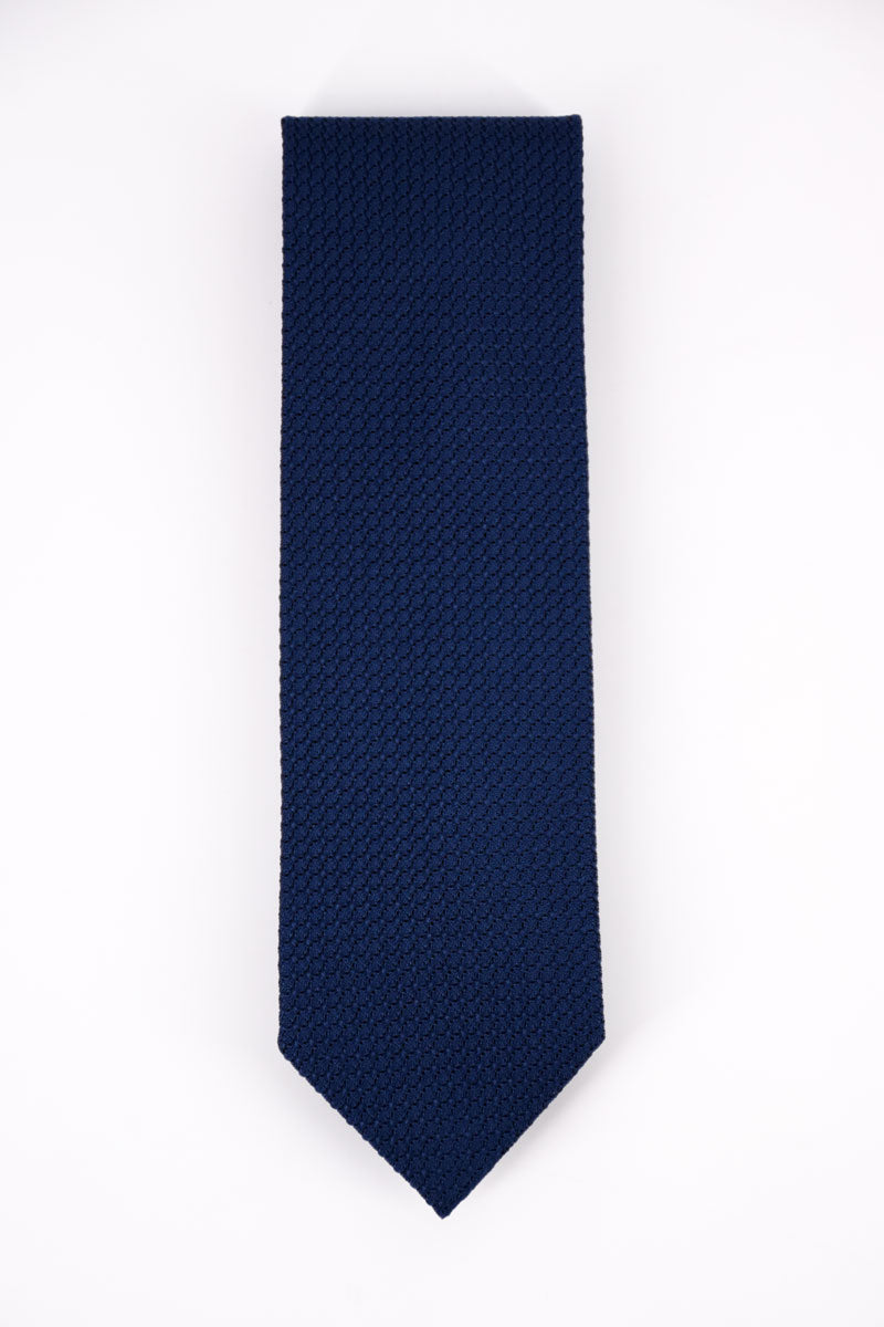 Blue denim silk grenadine tie by Ardentes Clipei, showing its double-layered design and textured fabric for formal wear.