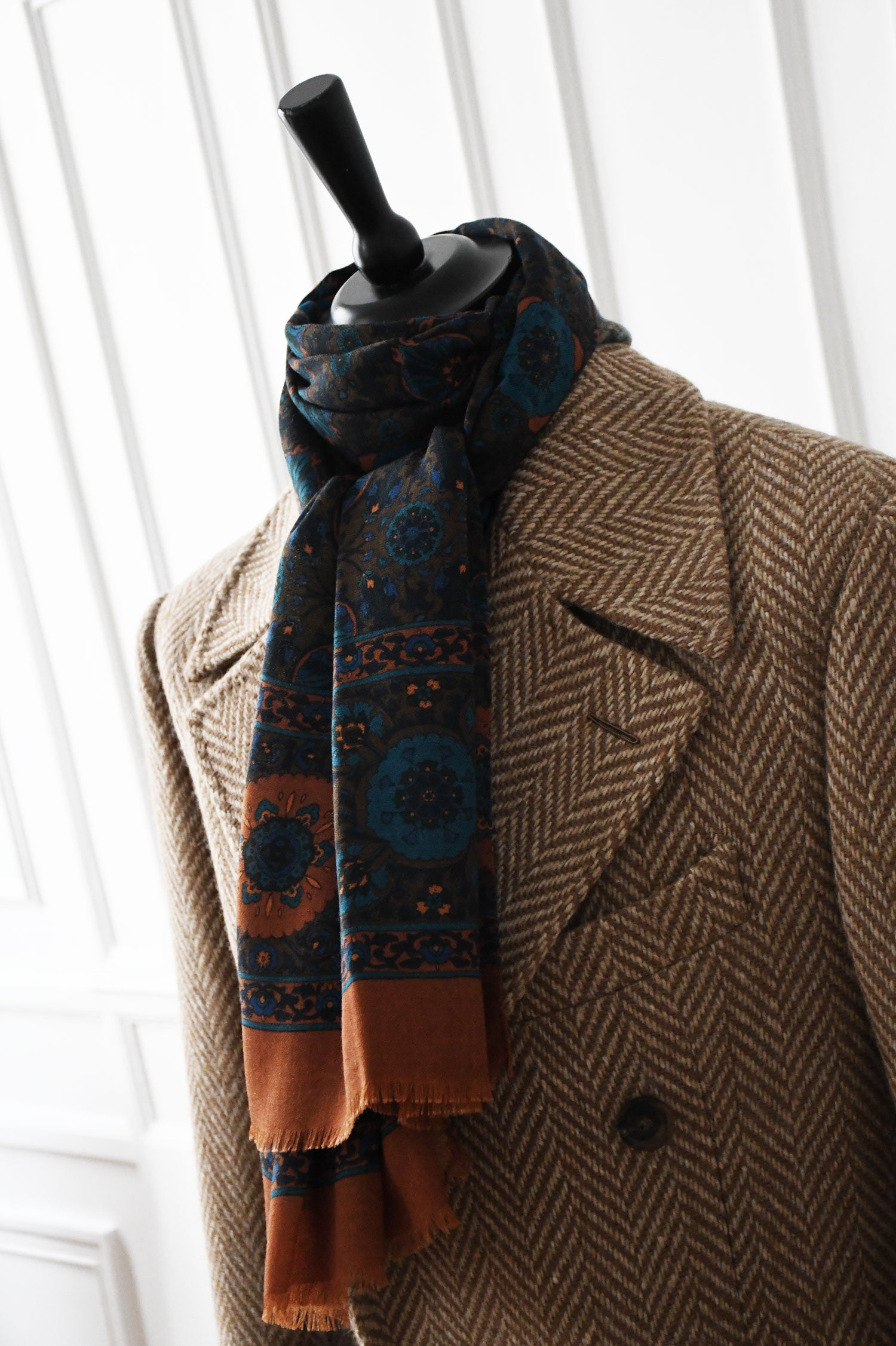 Orange ochre botanical motif scarf by Ardentes Clipei, showcasing vibrant colors and intricate leaf patterns.