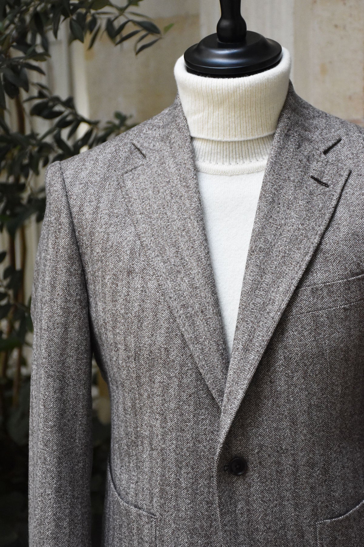 Cream-colored Ardent Ardentes Clipei lambswool turtleneck sweater for men, showing the knit texture and high neckline.