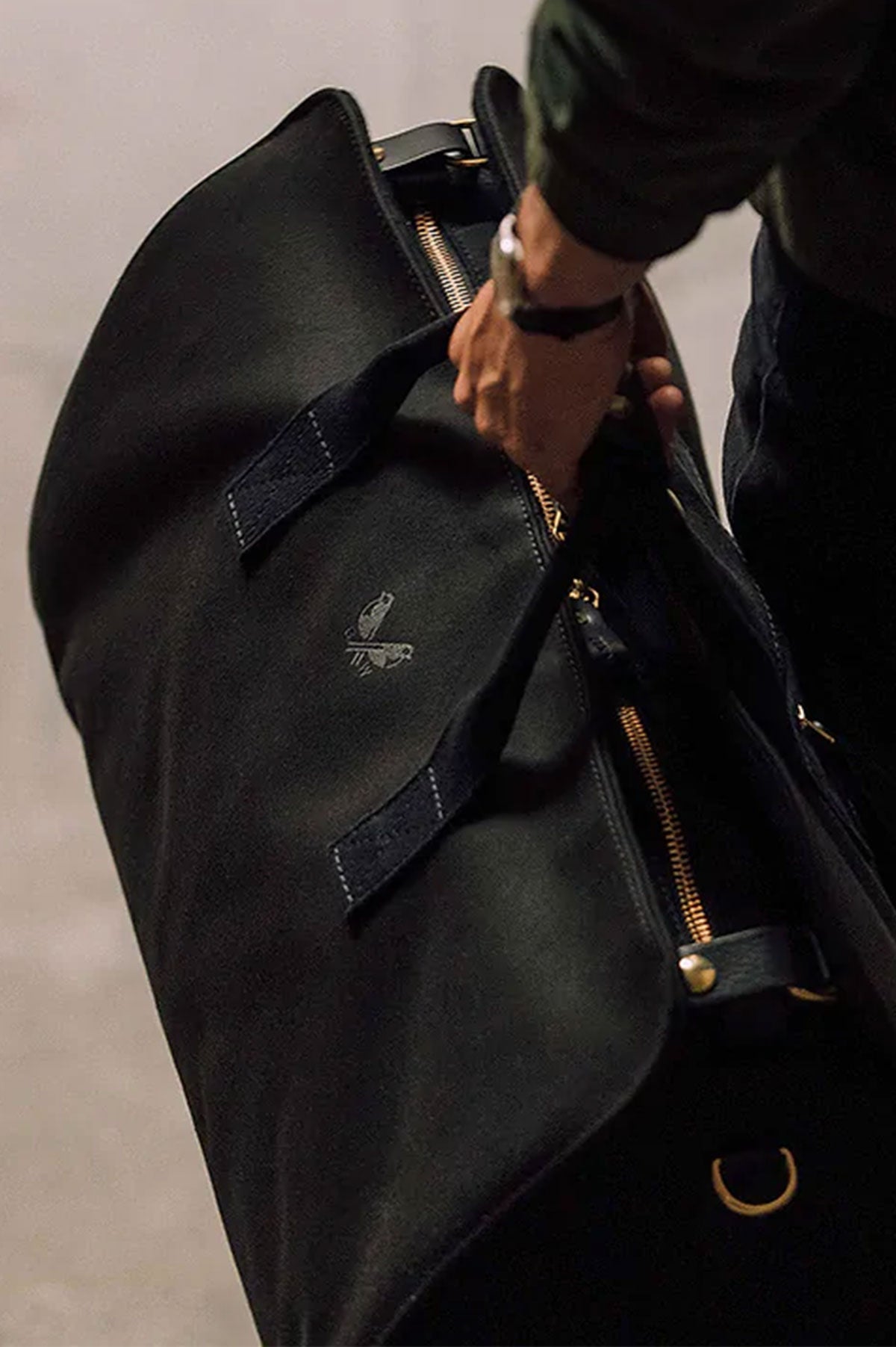 Black Bennett Winch suit carrier holdall by Ardentes Clipei, stylish maroquinerie for carrying suits and formal wear.