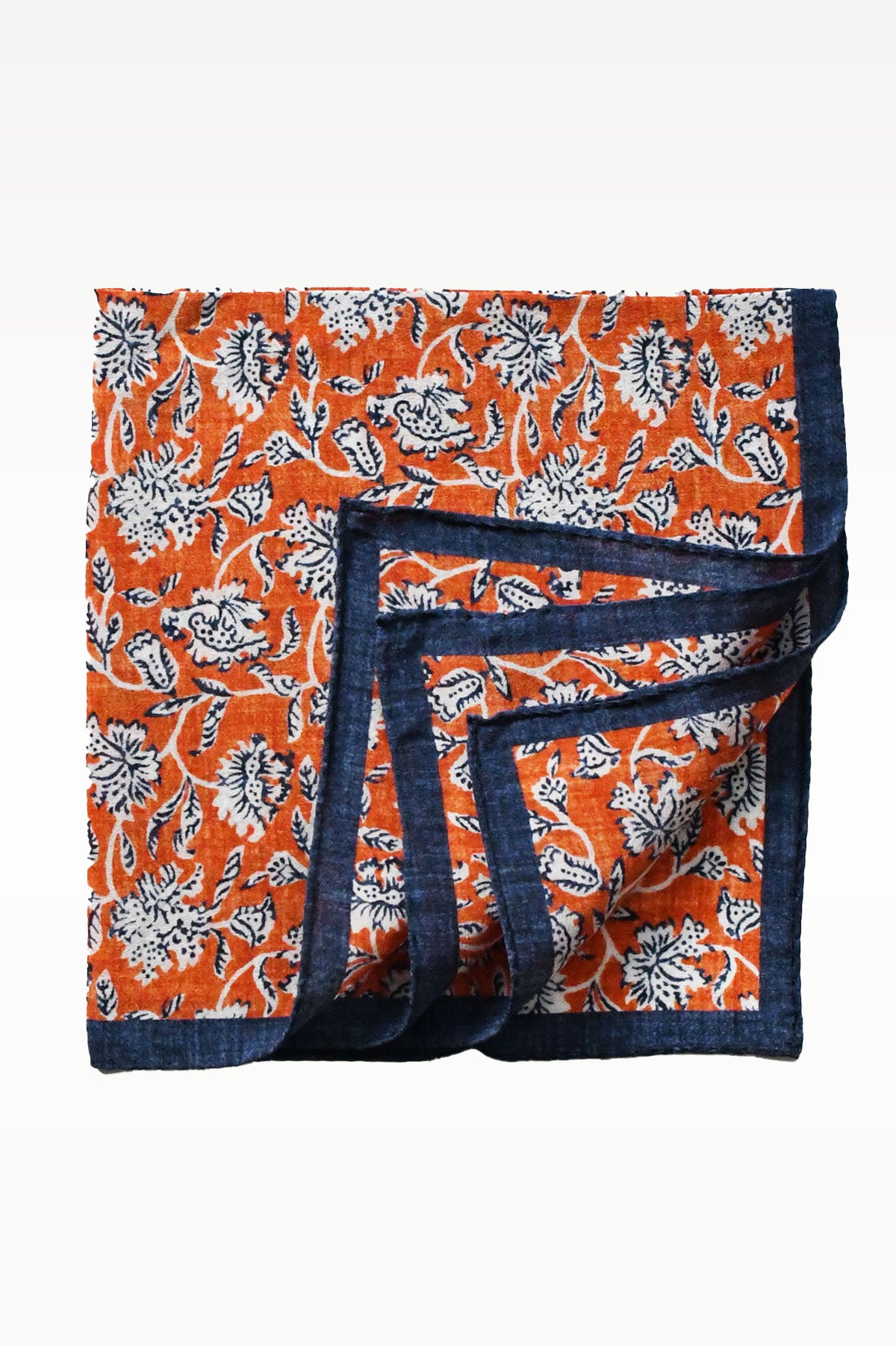 Orange floral motif pochette by Ardentes Clipei featuring vibrant flower patterns on a stylish accessory.