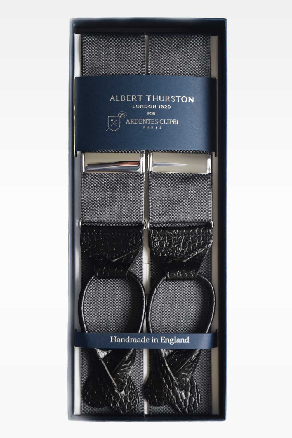 Gray anthracite suspenders from Albert Thurston, featuring classic strap design with adjustable clips for a refined look.