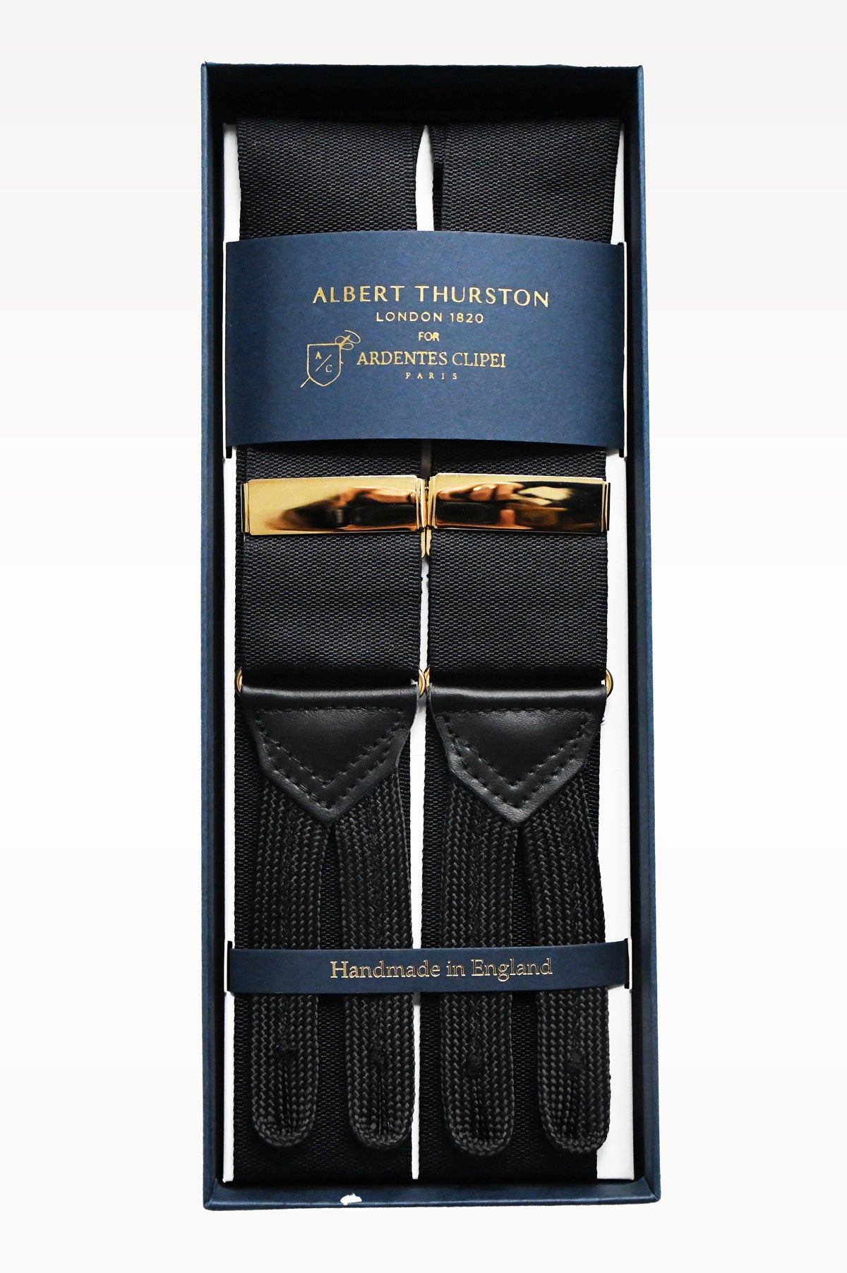 Black suspenders with gold accents from Albert Thurston, styled with Ardentes Clipei Bretelles Noires for a classic formal look.