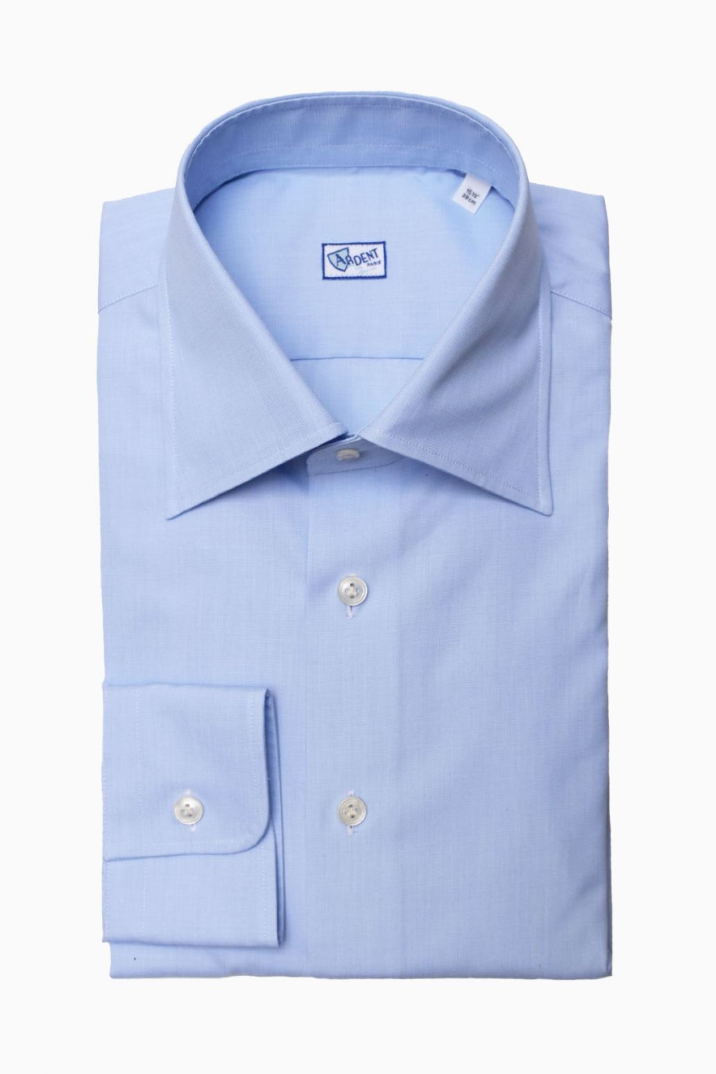 Light blue semi-spread collar chemise by Ardentes Clipei, shown on a model, featuring a relaxed fit and elegant design.