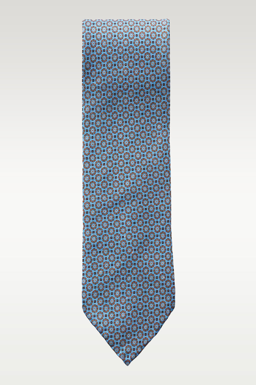 Blue sky-colored tie with geometric pattern in silk and linen from Ardentes Clipei, showcasing fine fabric and stylish design.