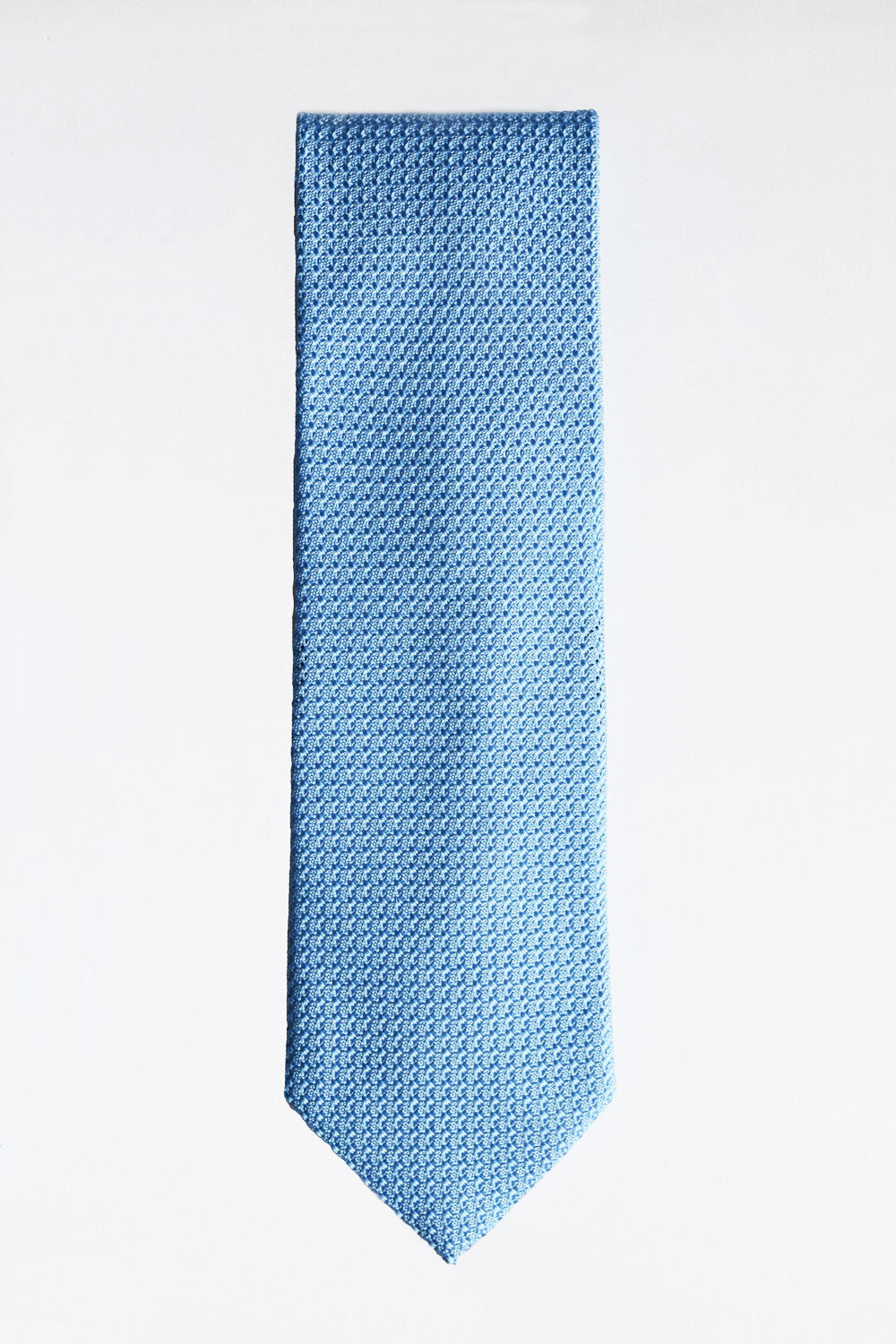 Light blue silk grenadine tie by Ardentes Clipei, double-layered, with a classic, elegant texture suitable for formal wear.