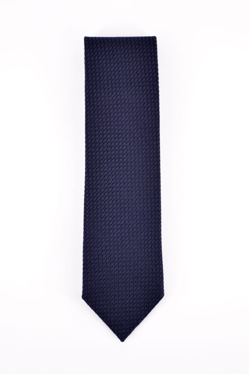 Deep navy blue silk grenadine tie by Ardentes Clipei, double-lined, featuring a classic and elegant design for formal occasions.