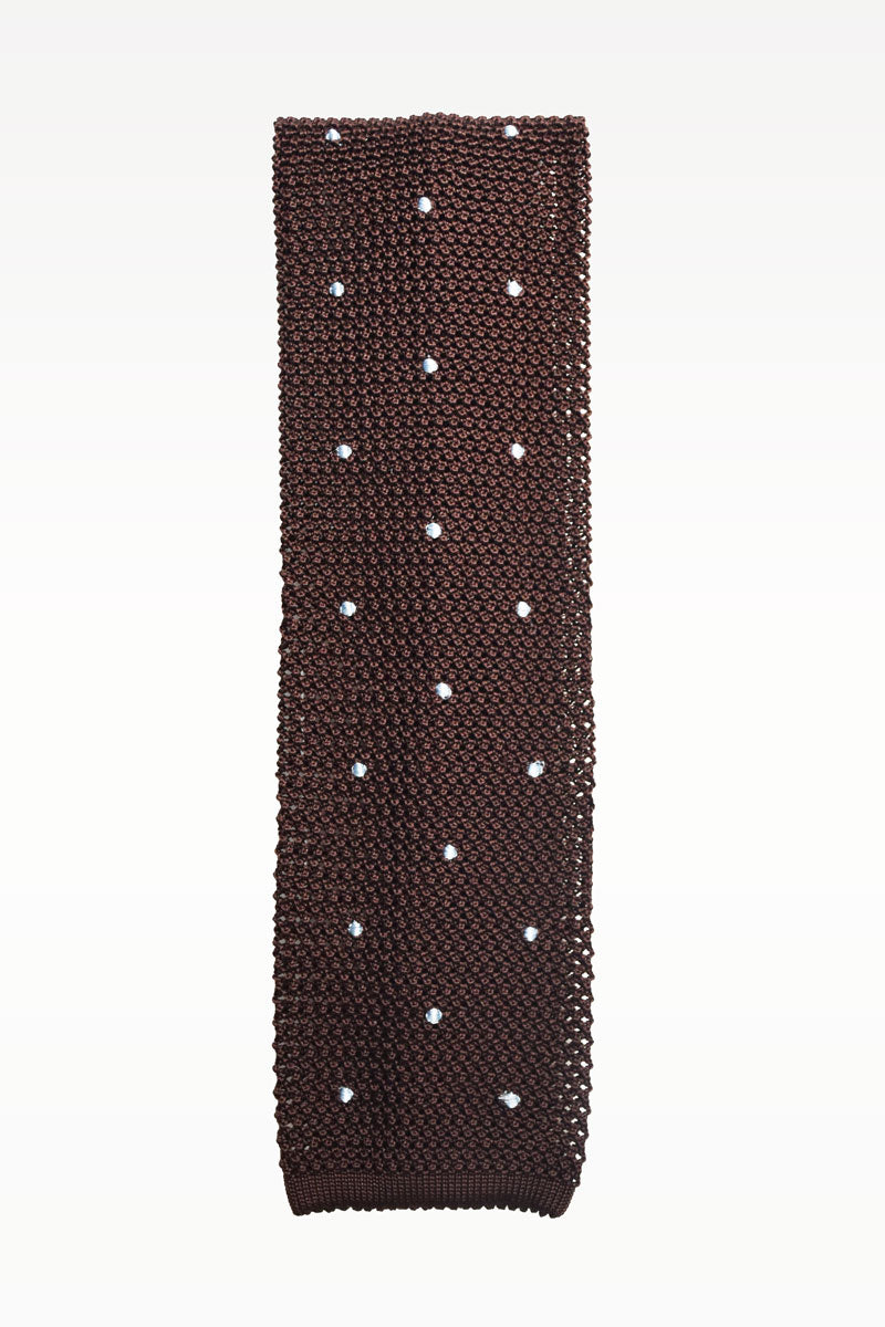 Brown knit tie with sky blue polka dots by Ardentes Clipei, showcasing its textured fabric and stylish pattern.