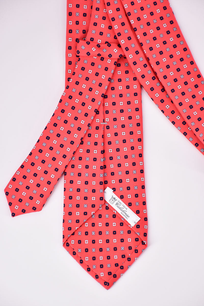 Pink floral motif tie from Ardentes Clipei featuring a stylish Calabrese design, perfect for adding elegance to formal attire.