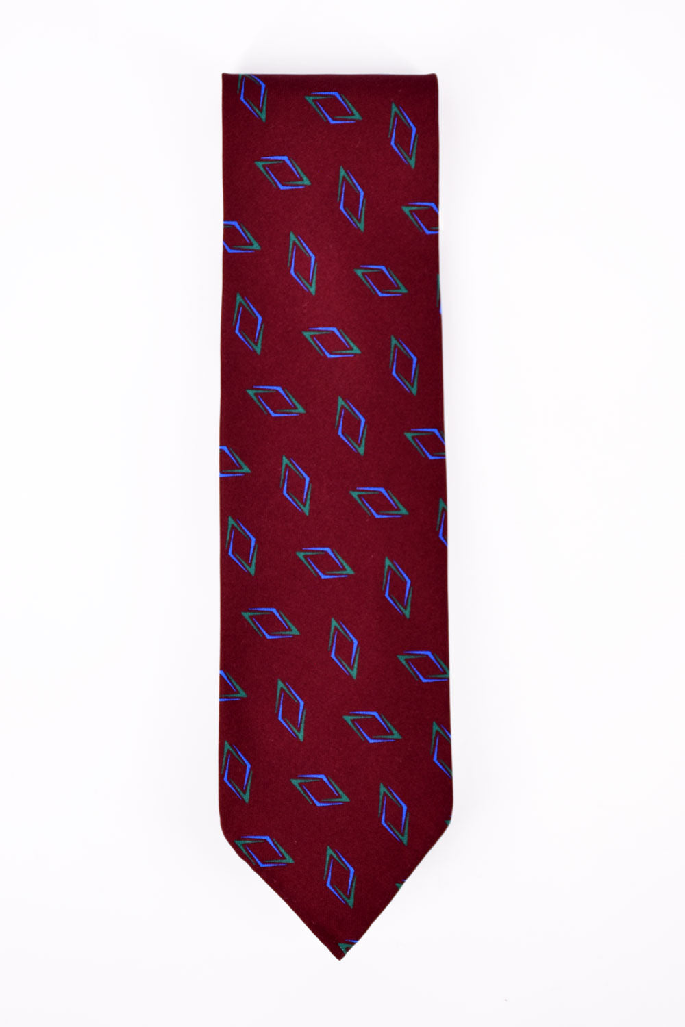 Red geometric patterned tie by Ardentes Clipei, featuring a stylish design, perfect for formal or professional attire.