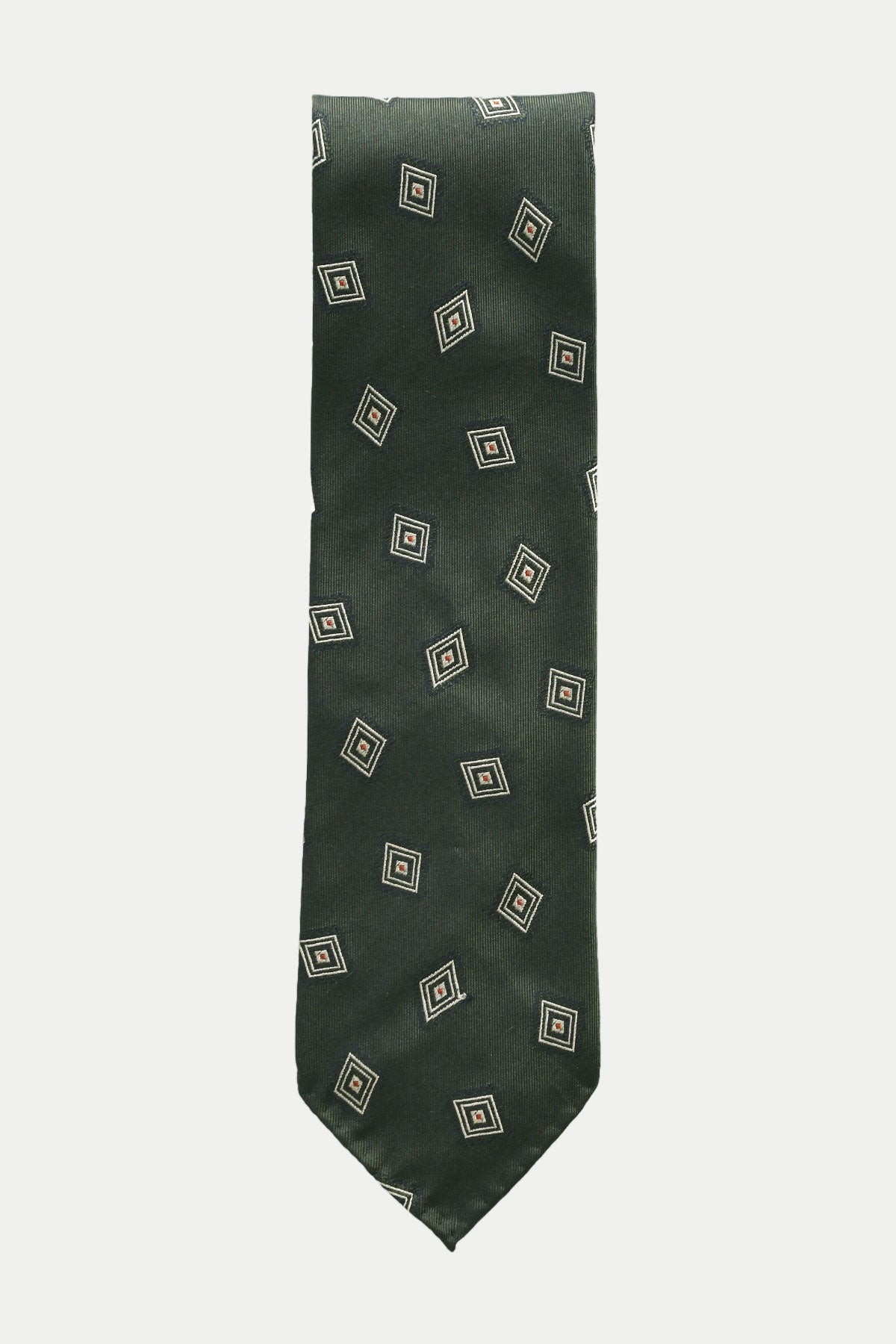 Green silk jacquard tie with diamond pattern by Ardentes Clipei, showing the detailed woven design and elegant texture.