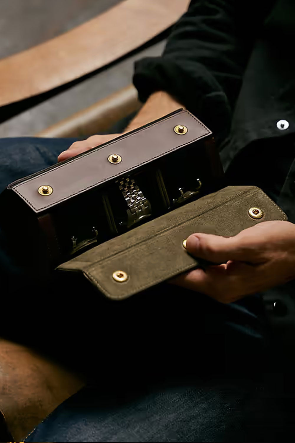 Brown triple watch roll by Bennett Winch, crafted from high-quality leather, designed for stylishly storing and protecting watches.