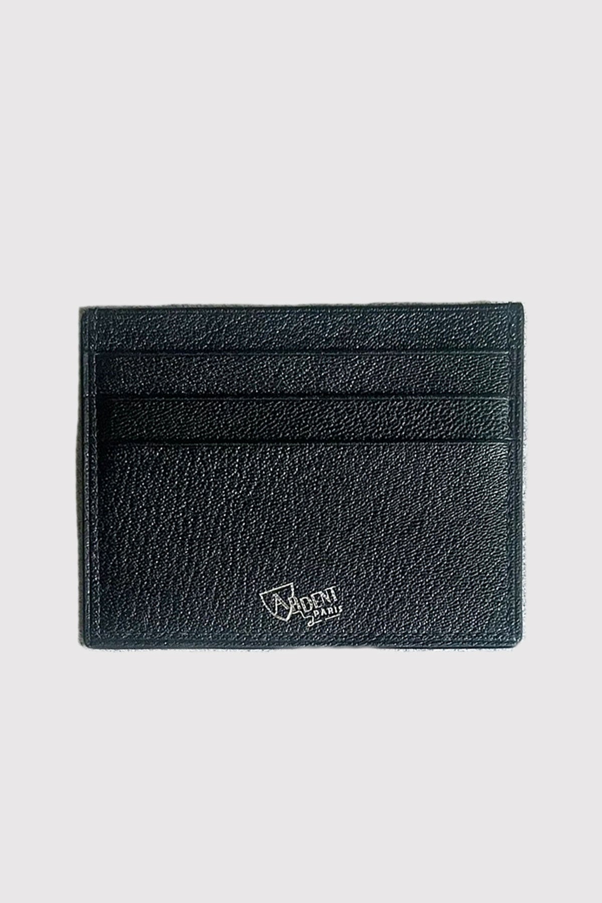 Black grain leather card holder by Ardentes Clipei, compact and stylish maroquinerie accessory for cards and cash.