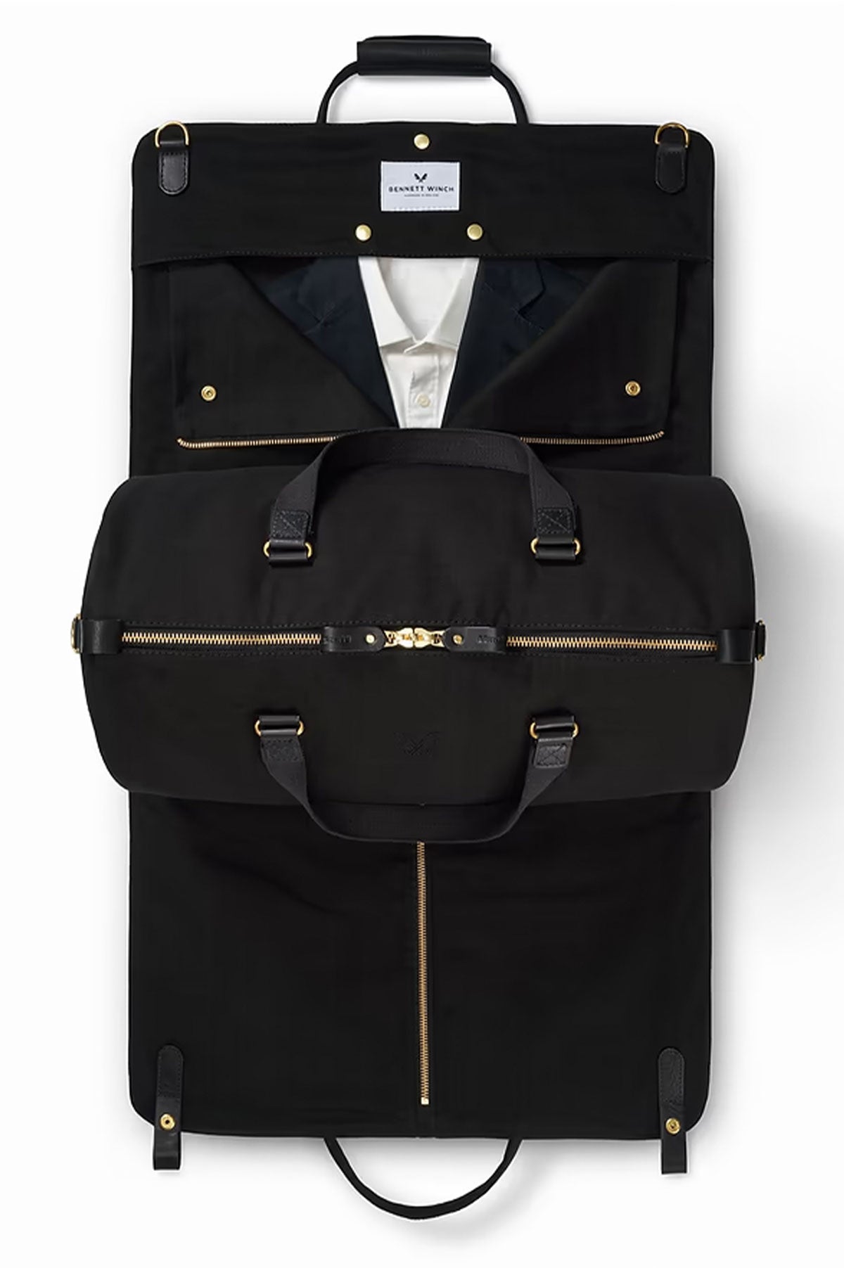 Black suit carrier holdall by Bennett Winch, Ardentes Clipei maroquinerie, designed for easy travel and garment protection.