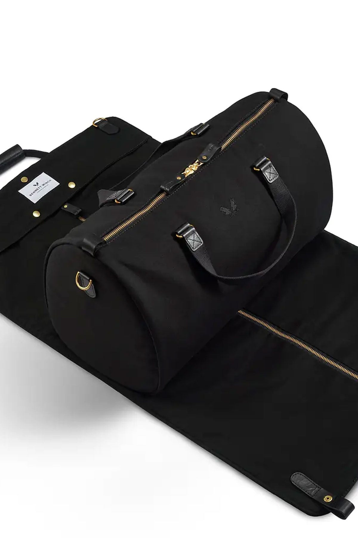 Black Bennett Winch suit carrier holdall for travel, made by Ardentes Clipei, featuring durable marquinerie design and spacious interior.