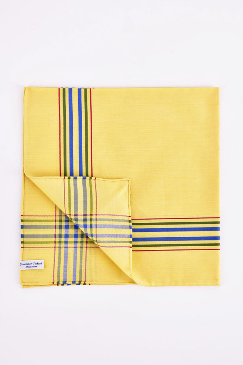 Yellow pocket square by Simonnot Godard for Ardentes Clipei, shown folded with subtle fabric texture and elegant design.