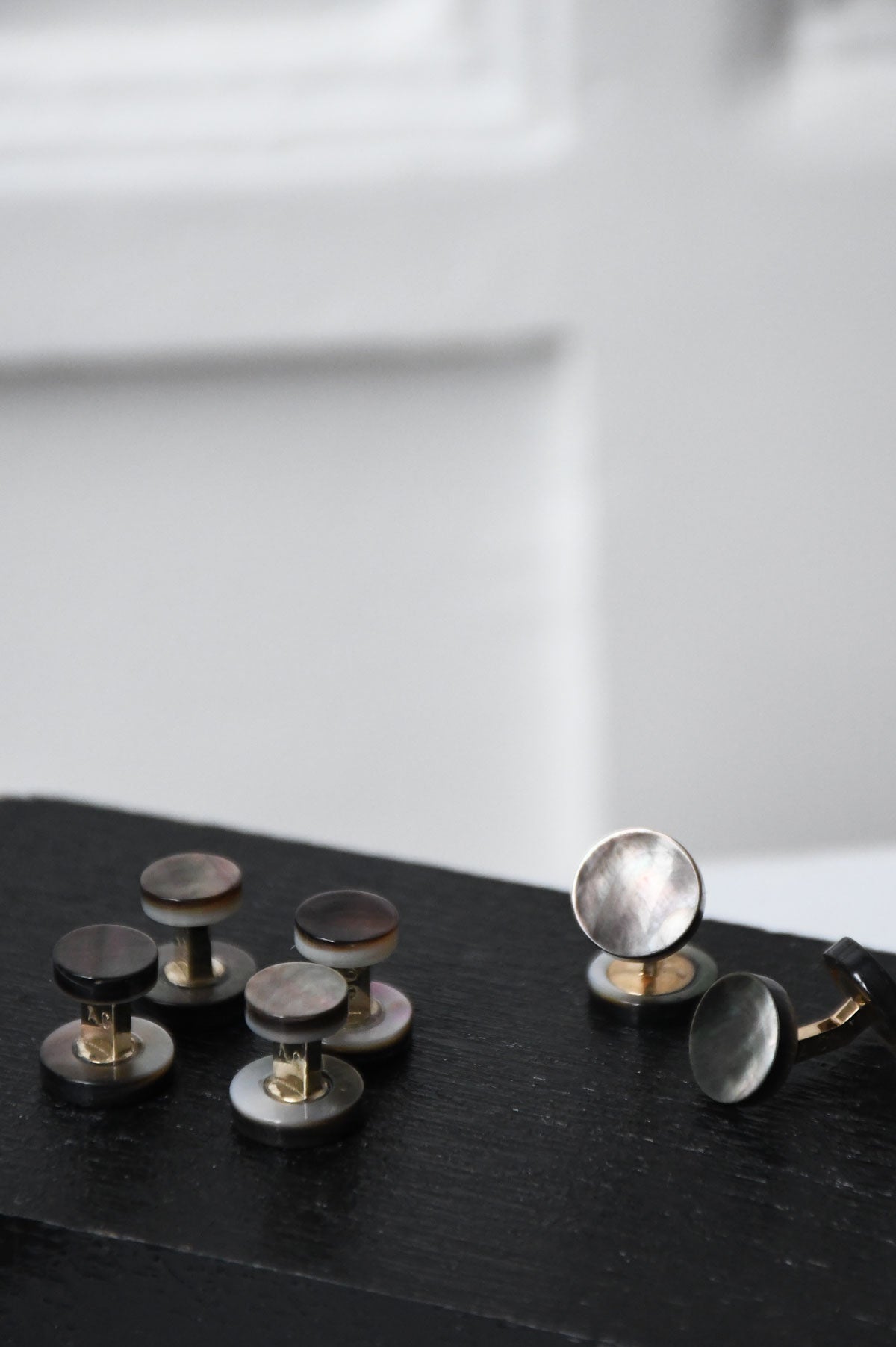 Gray nacre stud earrings by Ardentes Clipei from the Samuel Gassmann x Ardentes Clipei collection, showcasing elegant, textured design.
