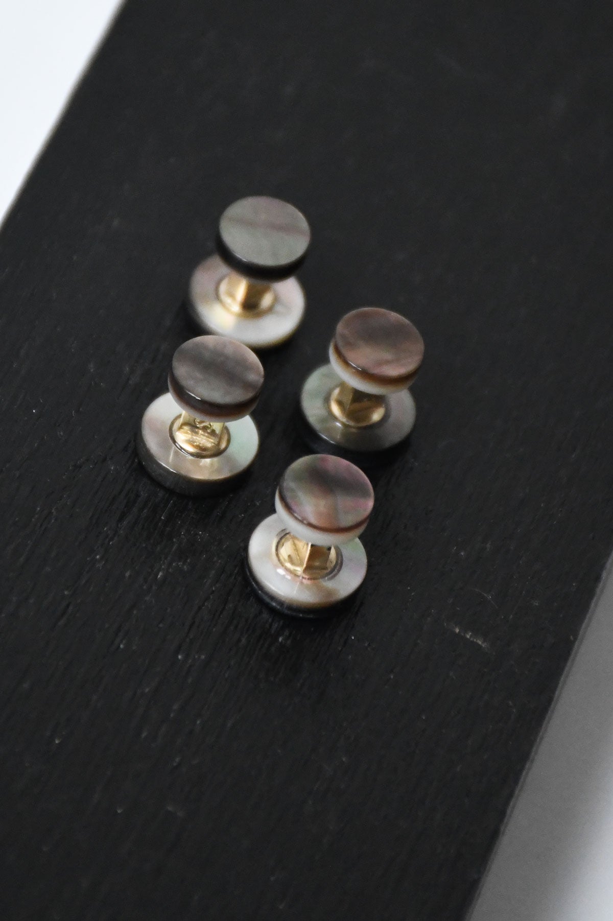 Gray nacre Studs by Ardentes Clipei from the Samuel Gassmann x Ardentes Clipei collection, featuring elegant, textured design.