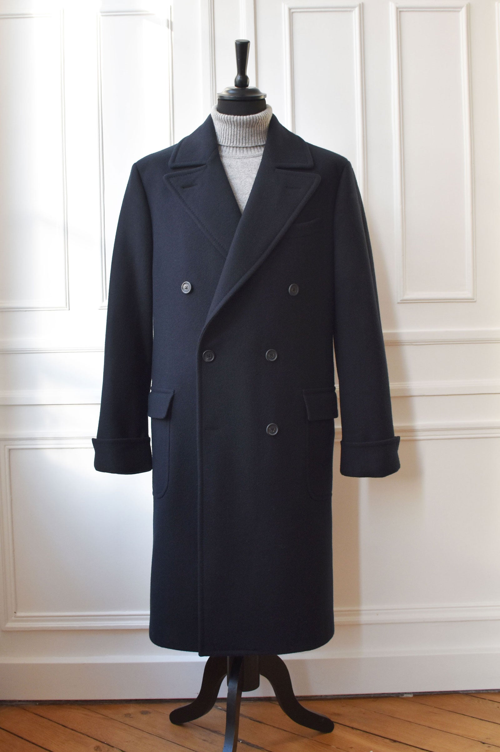 Navy tailored Ulster coat by Ardentes Clipei featuring a cross-over design and classic wool fabric, stylish and sophisticated.