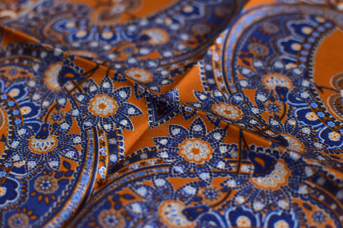 pochette orange et blue motif floral